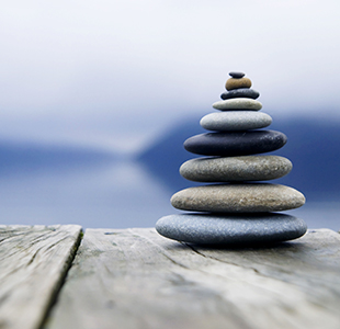 Photo of a pile of stones | The Mooring Counselling Service